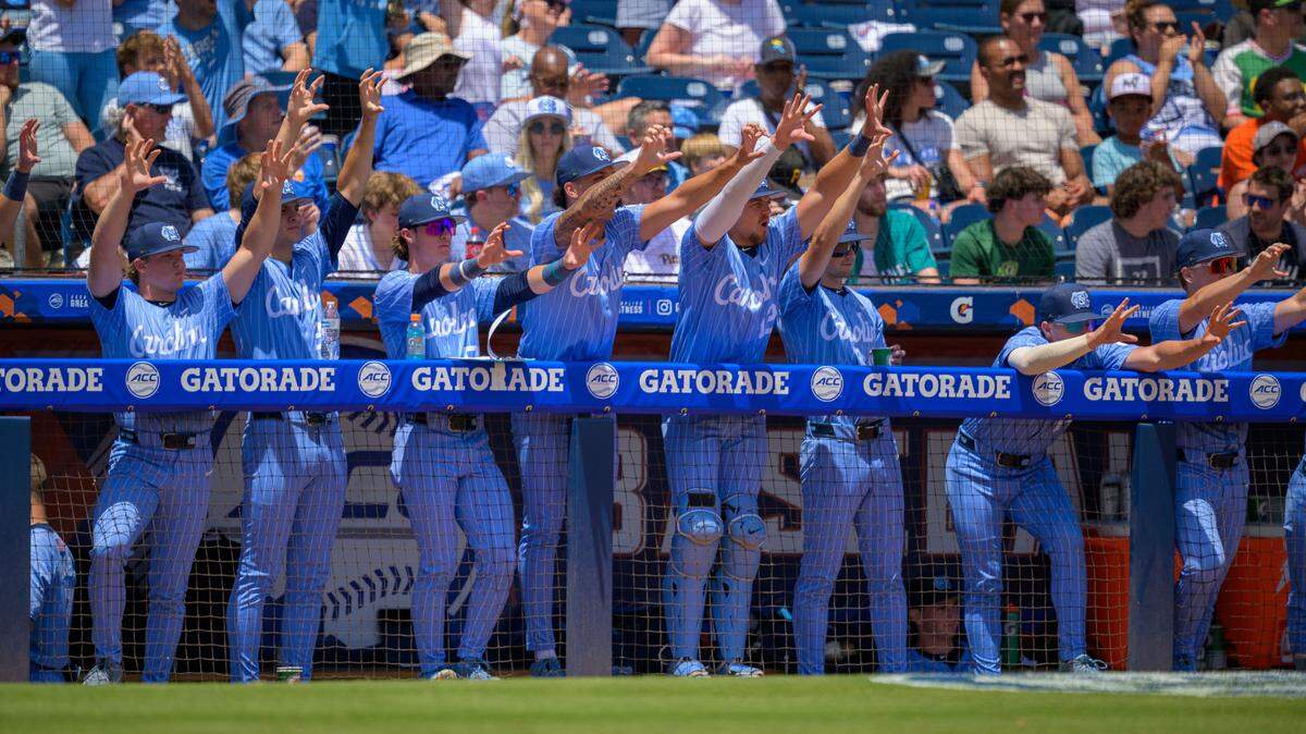 The UNC Tar Heels dugout celebrates during the ACC baseball championship game on Sunday, May 25, 2025, at Durham Bulls Athletic Park in Durham, N.C.
