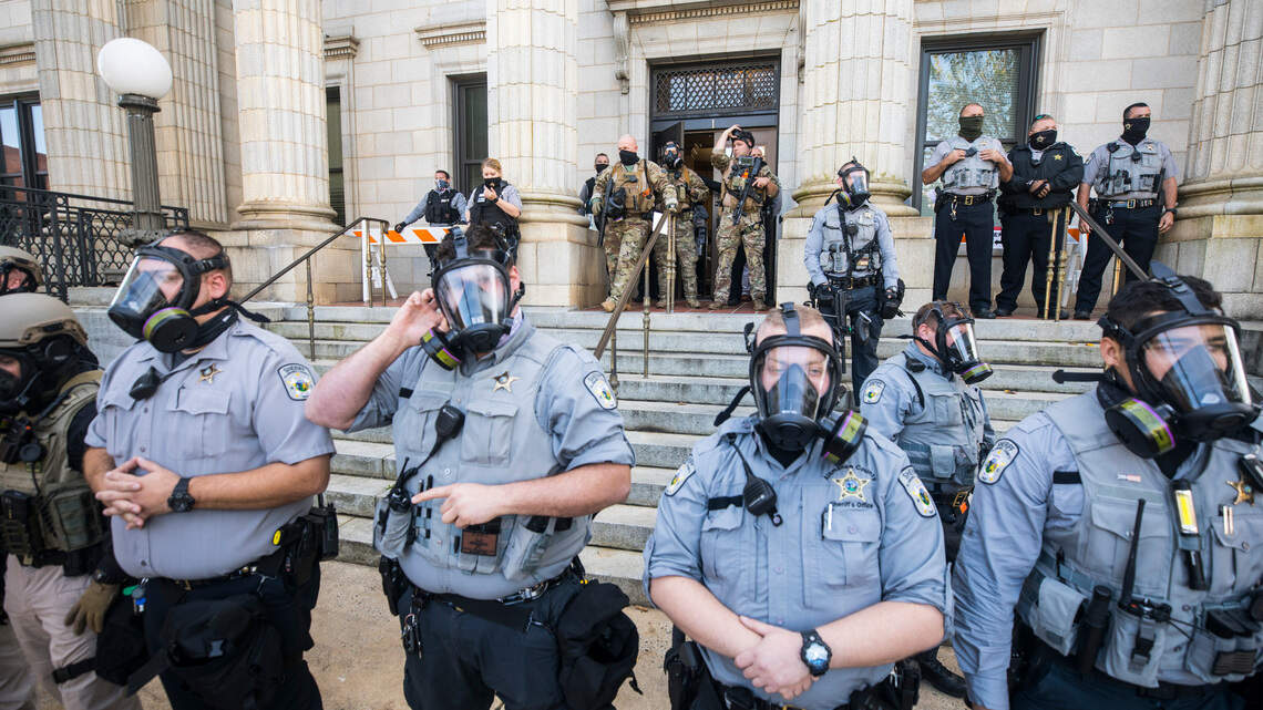 NC cops, protesters settle lawsuit over pepper spray use | Raleigh News ...