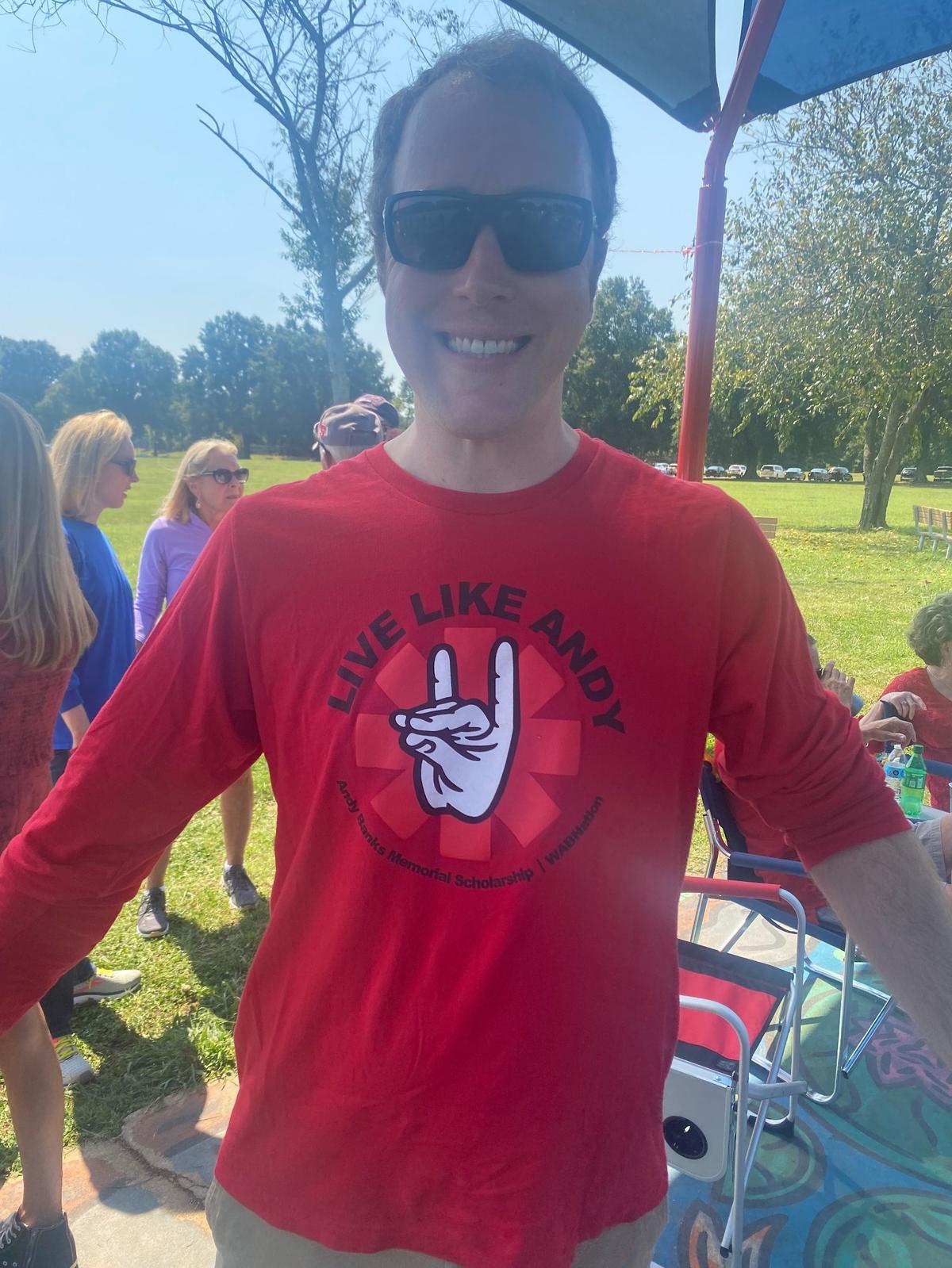 Mark Banks wears a shirt honoring his slain brother, Andy, funds from which support a scholarship fund at N.C. State University.