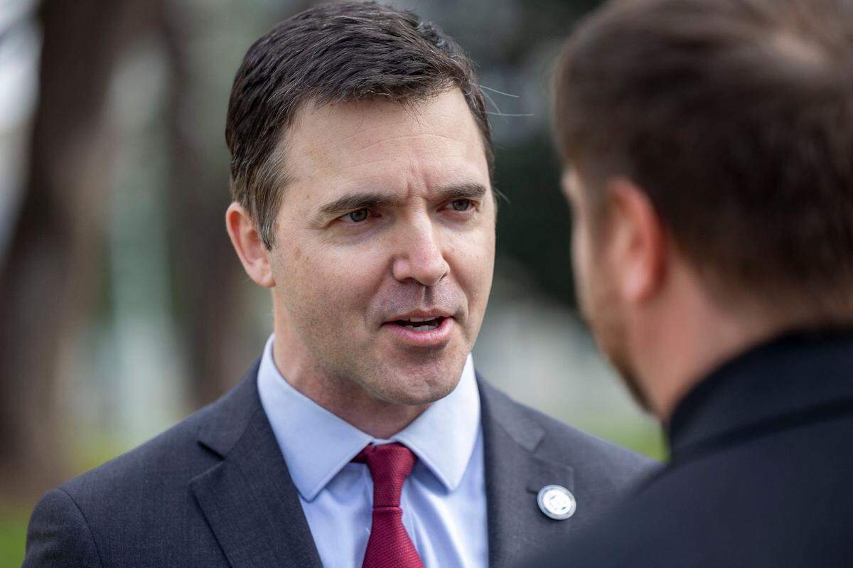 North Carolina Attorney General Jeff Jackson speaks to the crowd following a press briefing on President Trump’s executive orders on Friday, January 31, 2025 at the State Capitol in Raleigh, N.C.