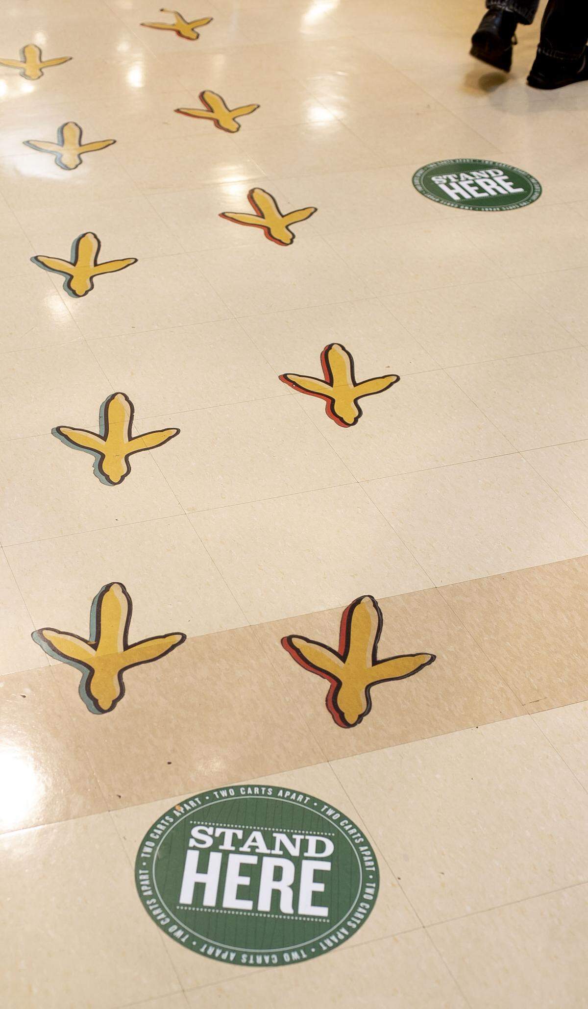 Lowes Foods has installed stickers to help shoppers keep the proper social distance to prevent the spread of the COVID-19 virus while doing their grocery shopping.
