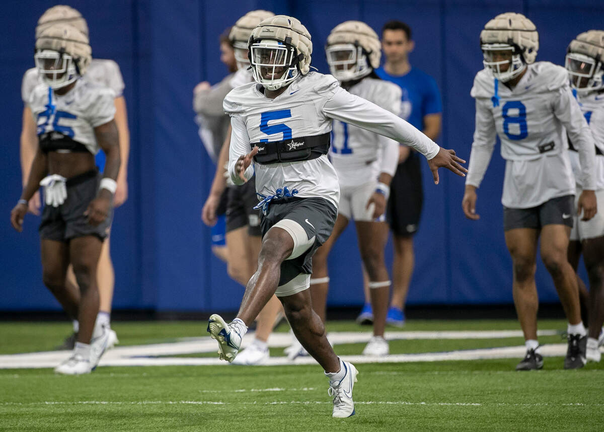 Duke wide receiver Jalon Calhoun (5) works out during the Blue Devils’ spring practice on Friday, March 24, 2023 in Durham, N.C