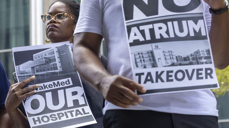 ‘This is a bad deal.’ WakeMed/Atrium Health merger critics rally ahead of county vote