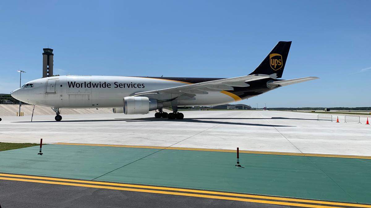A UPS plane parks in the West Remain Overnight apron at Raleigh-Durham International Airport on April 17, 2023. Airlines can park up to 8 large planes at the West RON, near Terminal 2, when all the terminal gates are full.