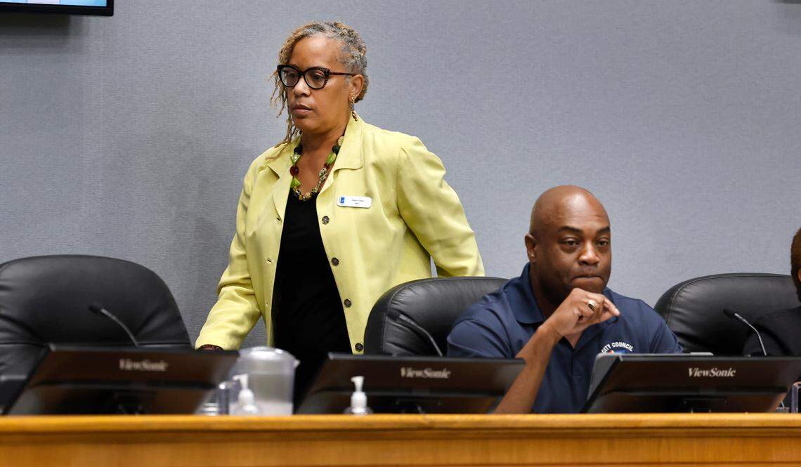 Durham Mayor Elaine O’Neal walks past Mayor Pro Tempore Mark-Anthony Middleton while they were discussing pay for city workers during a council work session at City Hall in Durham, N.C., Thursday, Sept. 7, 2023.