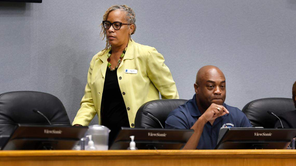 Durham Mayor Elaine O’Neal walks past Mayor Pro Tempore Mark-Anthony Middleton while they were discussing pay for city workers during a council work session at City Hall in Durham, N.C., Thursday, Sept. 7, 2023.