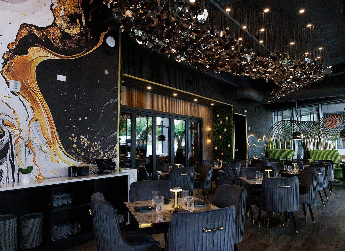 The dining area of Tamasha Modern Indian is photographed on Wednesday, May 8, 2024, in Raleigh, N.C. Tamasha is one of 19 Triangle restaurants selected for the new American South Michelin Guide. 