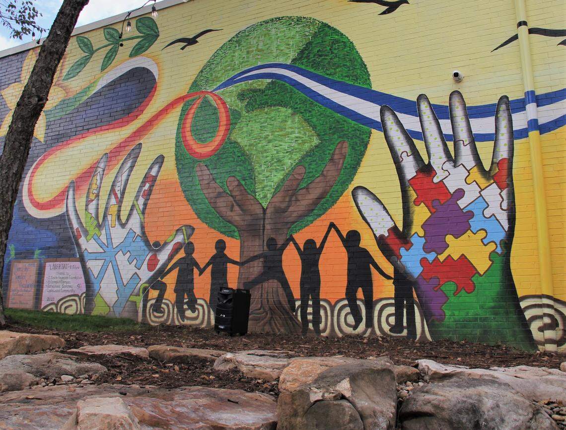 A new 150-foot mural in Durham’s Lakewood Shopping Center celebrates North Carolina’s diversity. Led by artists Cornelio Campos and Estephani Sanchez, the project includes a recycling stream and has transformed a once vacant space between buildings. “Before this, this was nothing ... a trash can, beer bottles and needles,” says Luke Smith, director of El Futuro, a mental health clinic that collaborated on the project with The Scrap Exchange, a creative reuse center.