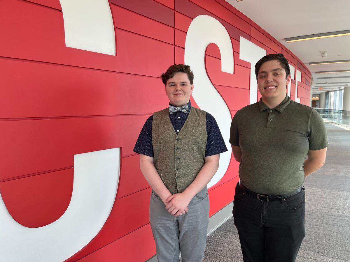 N.C. State students Wyat Hamilton, left, and Adam Fleischer pose for a photo at Talley Student Union on June 9, 2023.