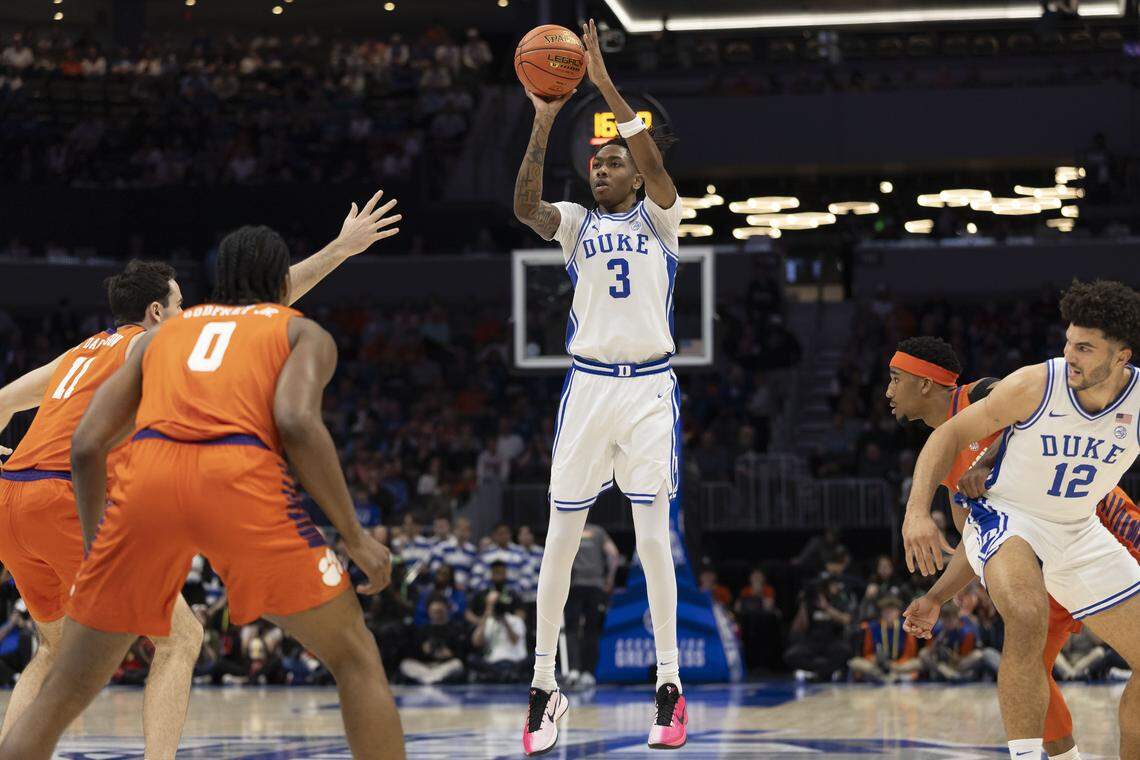 Duke forward Isaiah Evans (3) launches a three-point shot in the first half against Clemson on Friday, March 13, 2026, during the semifinals of the ACC Tournament at Spectrum Center in Charlotte, N.C.