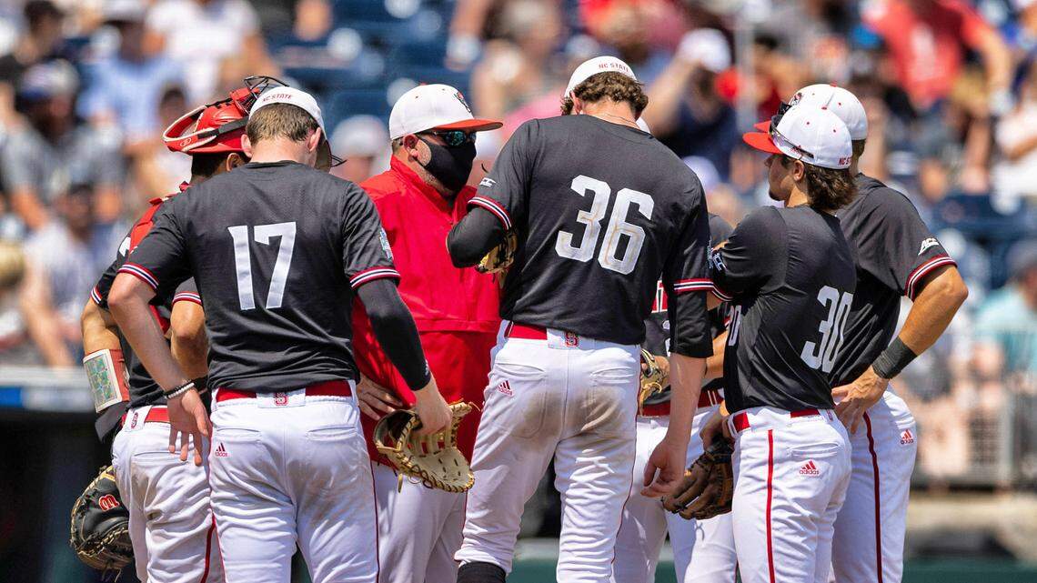 North Carolina State players meet on the mound around starting pitcher Garrett Payne (36) in the fourth inning against Vanderbilt during a baseball game in the College World Series, Friday, June 25, 2021, at TD Ameritrade Park in Omaha.