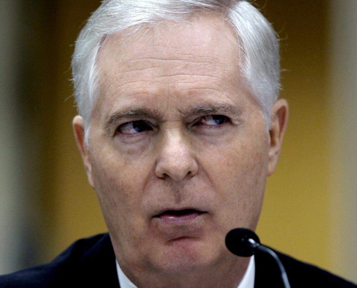 Former Democratic Gov. Mike Easley during a conversation with Larry Leake, the State Board of Elections chairman, about campaign finances during a board hearing in October 2009.