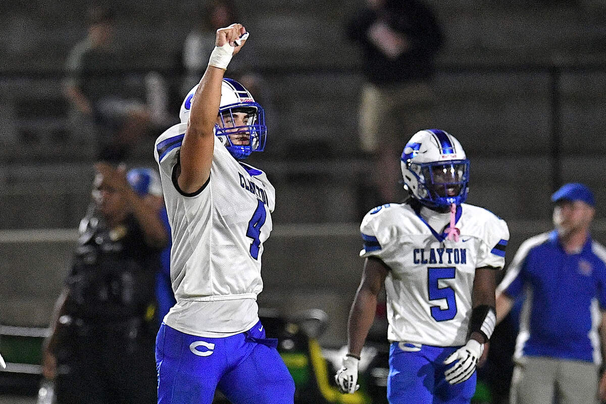Clayton linebacker Codie Witmer (4) reacts after a stop against Wake Forest during the second half. The Wake Forest Cougars and the Clayton Comet met in a non-conference football game in Wake Forest, N.C. on August 23, 2024.