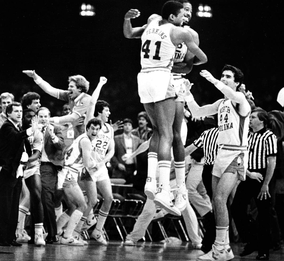 North Carolina's Sam Perkins and James Worthy jump in the air after they defeated Georgetown 63-62 to win the NCAA championship played at the Superdome in New Orleans in this March 30, 1982 photo.