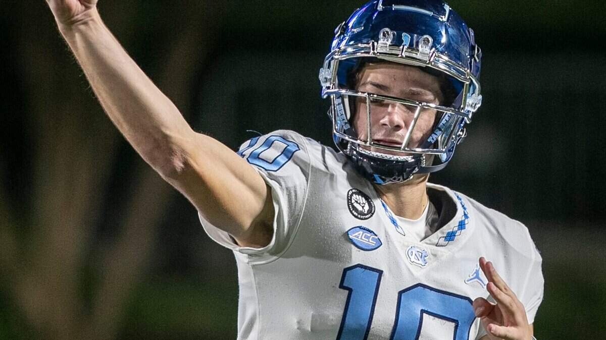 North Carolina quarterback Drake Maye (10) warms up for the Tar Heels’ game against Duke on Saturday, October 15, 2022 at Wallace-Wade Stadium in Durham, N.C.