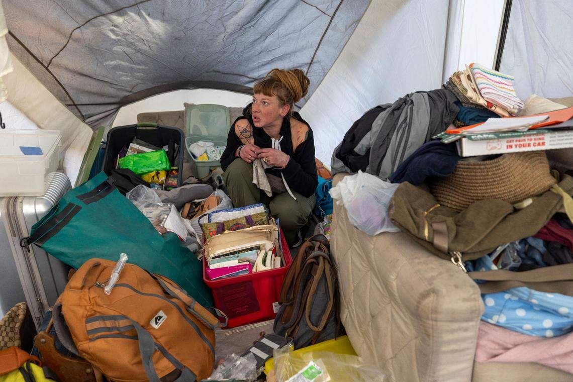 Nicole Reynolds, says she feels fortunate to have such a large tent for a home, as she packs up her personal belongings on Friday, January 31, 2025 in Raleigh, N.C. Reynolds is among a group of people who have been living in an encampment between Goode Street and the State Farmers Market . The land was recently posted asking for the property to be vacated by January 31, 2025.