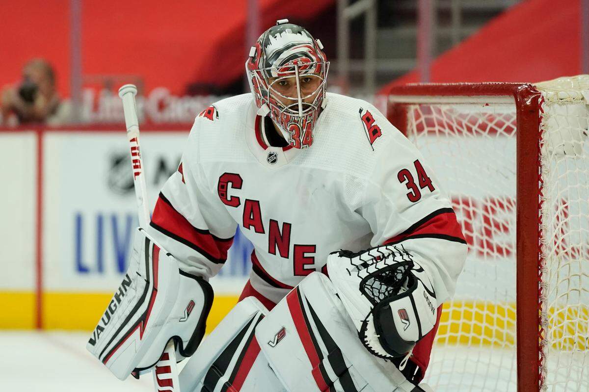 Carolina Hurricanes goaltender Petr Mrazek (34) plays against the Detroit Red Wings in the second period of an NHL hockey game Saturday, Jan. 16, 2021, in Detroit. (AP Photo/Paul Sancya)