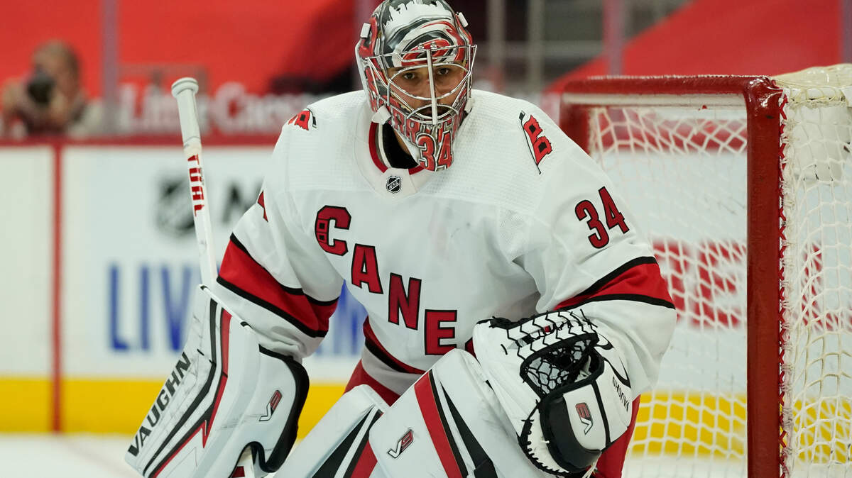 Carolina Hurricanes goaltender Petr Mrazek (34) plays against the Detroit Red Wings in the second period of an NHL hockey game Saturday, Jan. 16, 2021, in Detroit. (AP Photo/Paul Sancya)