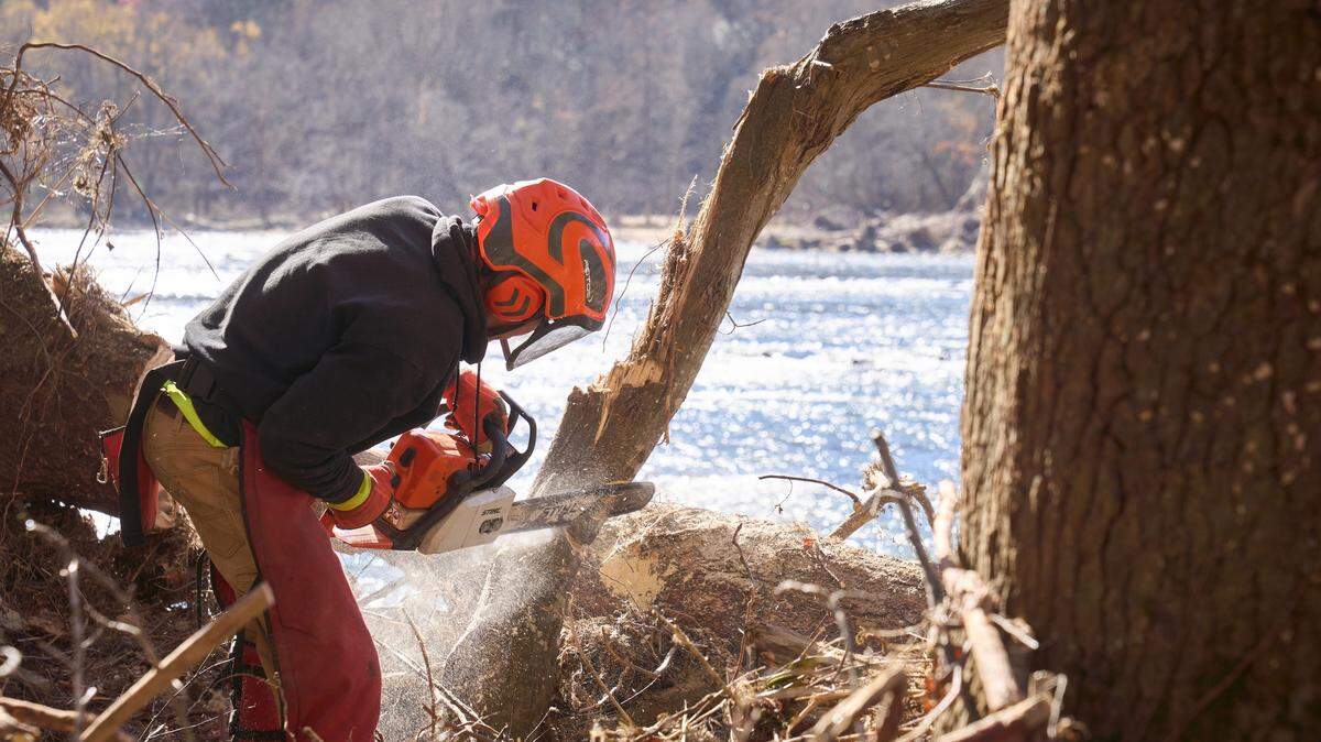 The Carolina Mountain Club bought 130 volunteers in November 2024 to help clear debris left by Hurricane Helene along the Appalachian Trail and the French Broad River in the town of Hot Springs.