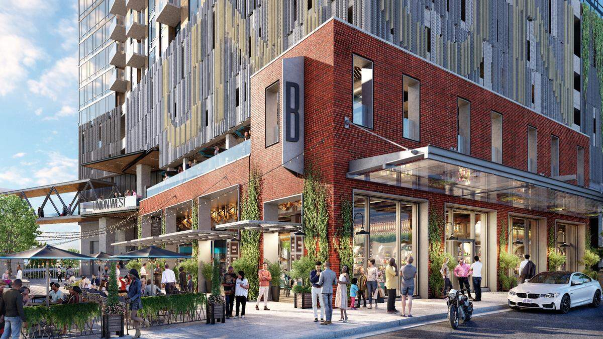 A rendering of Union West, the planned retail and apartment complex on West Street in downtown Raleigh. The project will include a bus depot for GoRaleigh and GoTriangle buses adjacent to Raleigh Union Station. The bus station and some of the apartments are expected to open in 2025.