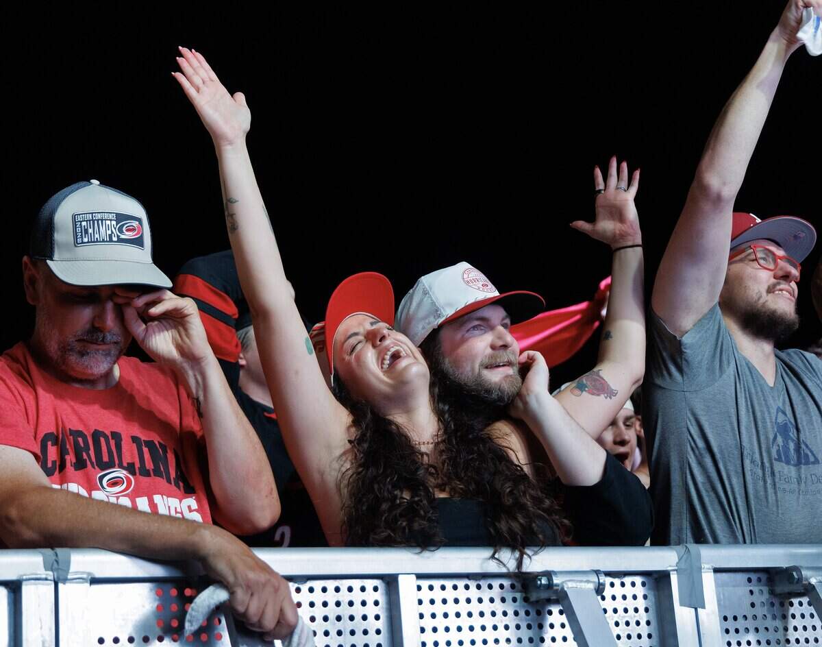 Carolina Hurricanes fans celebrate the team’s Stanley Cup victory over the Vegas Golden Knights during a watch party outside the Lenovo Center on Sunday, June 14, 2026, in Raleigh, N.C.