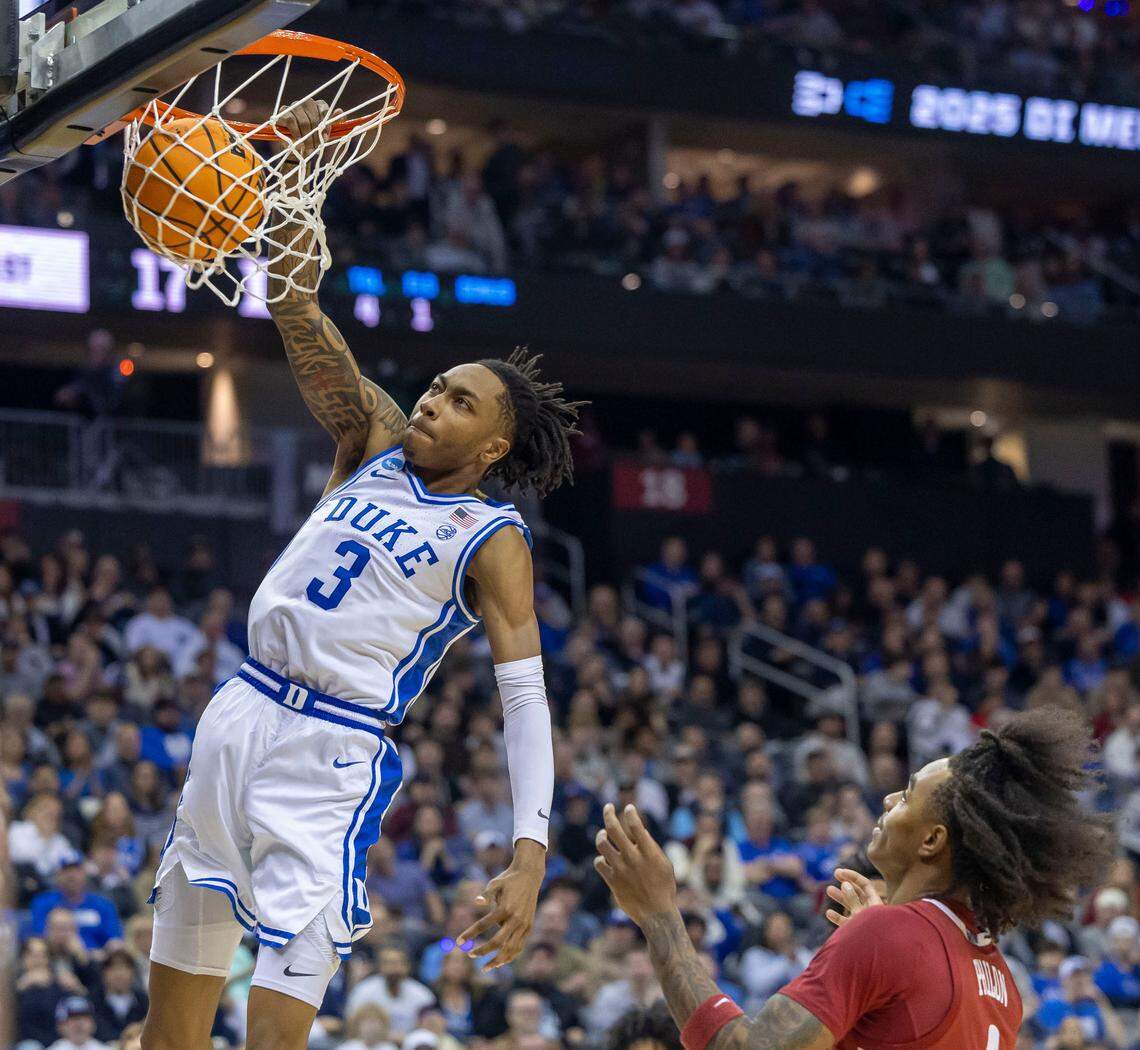Duke forward Isaiah Evans (3) dunks over Alabama’s Labaron Philon (0) in the first half on Saturday, March 29, 2025 during the NCAA East Regional final at Prudential Center in Newark, N.J.