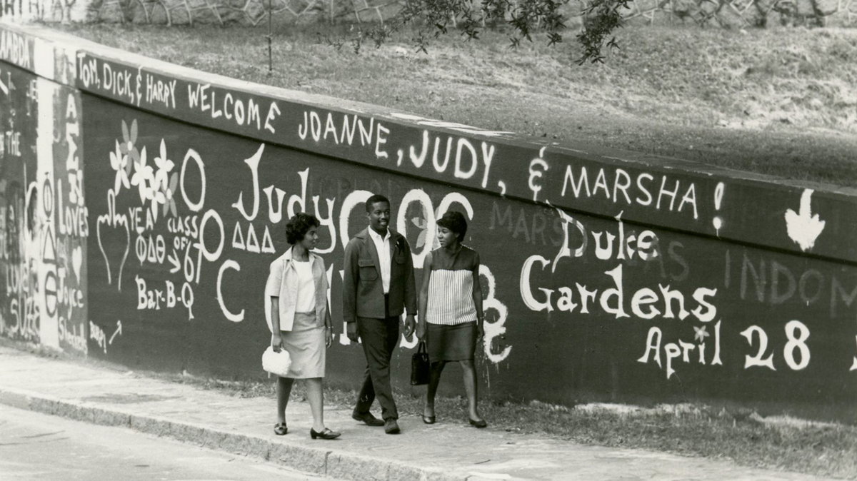 Nathaniel White, Jr., center, was a native of Durham and one of the first African-American students to graduate in 1967.