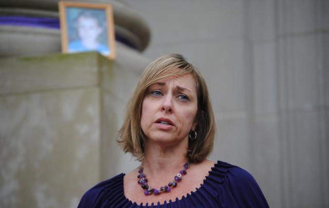 Johnston County District Attorney Susan Doyle speaks during a candlelight vigil in Smithfield.