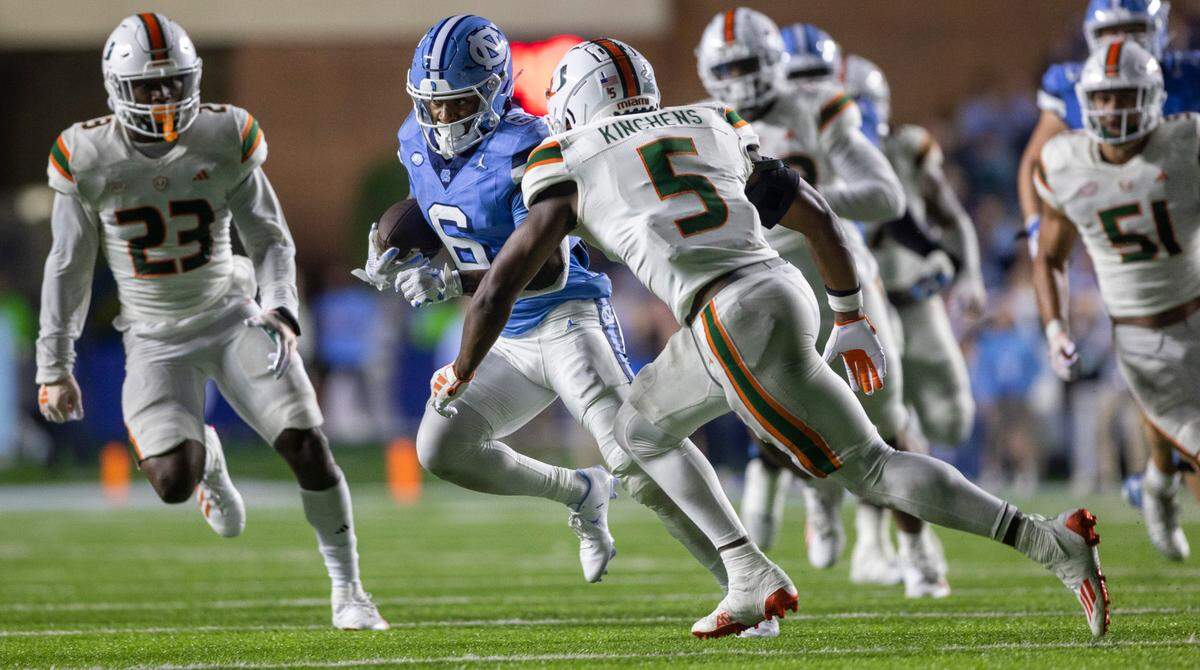 North Carolina’s Nate McCollum (6) picks up 15-yards on a pass completion from quarterback Drake Maye in the fourth quarter against Miami on Saturday, October 14, 2023 at Kenan Stadium in Chapel Hill, N.C.