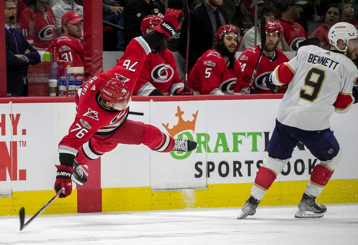 Florida Panthers Sam Bennett (9) checks the Carolina Hurricanes Brady Skjei (76) in the second period during Game 2 of the Eastern Conference Finals on Saturday, May 20, 2023 at PNC Arena in Raleigh, N.C.