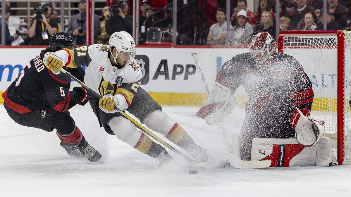 Vegas center Brett Howden (21) tries to score on Carolina Hurricanes goalie Frederik Andersen (31) in the second period during Game 2 of the Stanley Cup Final, on Thursday, June 4, 2026 at Lenovo Center in Raleigh, N.C. 