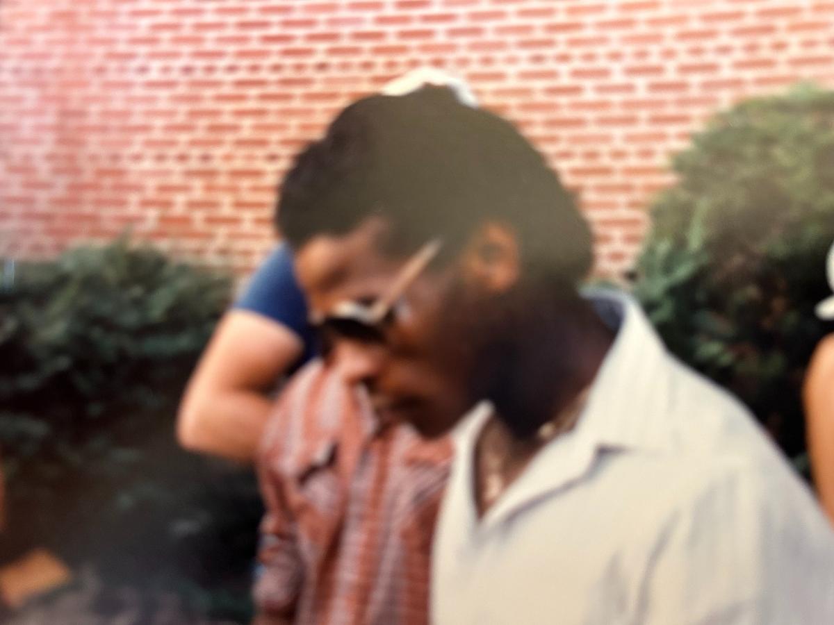 Rickey Henderson of the Oakland A’s signs an autograph for Josh Shaffer in 1981, captured by the young fan in this blurry photograph.