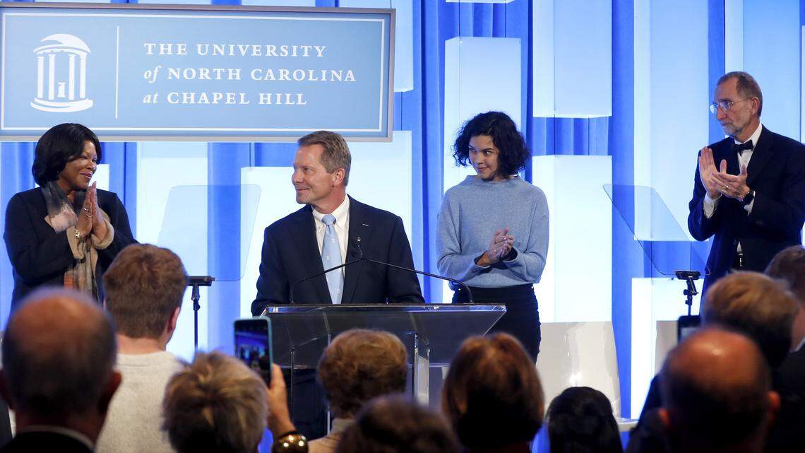 UNC-Chapel Hill Chancellor Kevin Guskiewicz gets a standing ovation before he speaks during a ceremony in Chapel Hill, N.C. celebrating Guskiewicz being named chancellor Friday, Dec. 13, 2019.