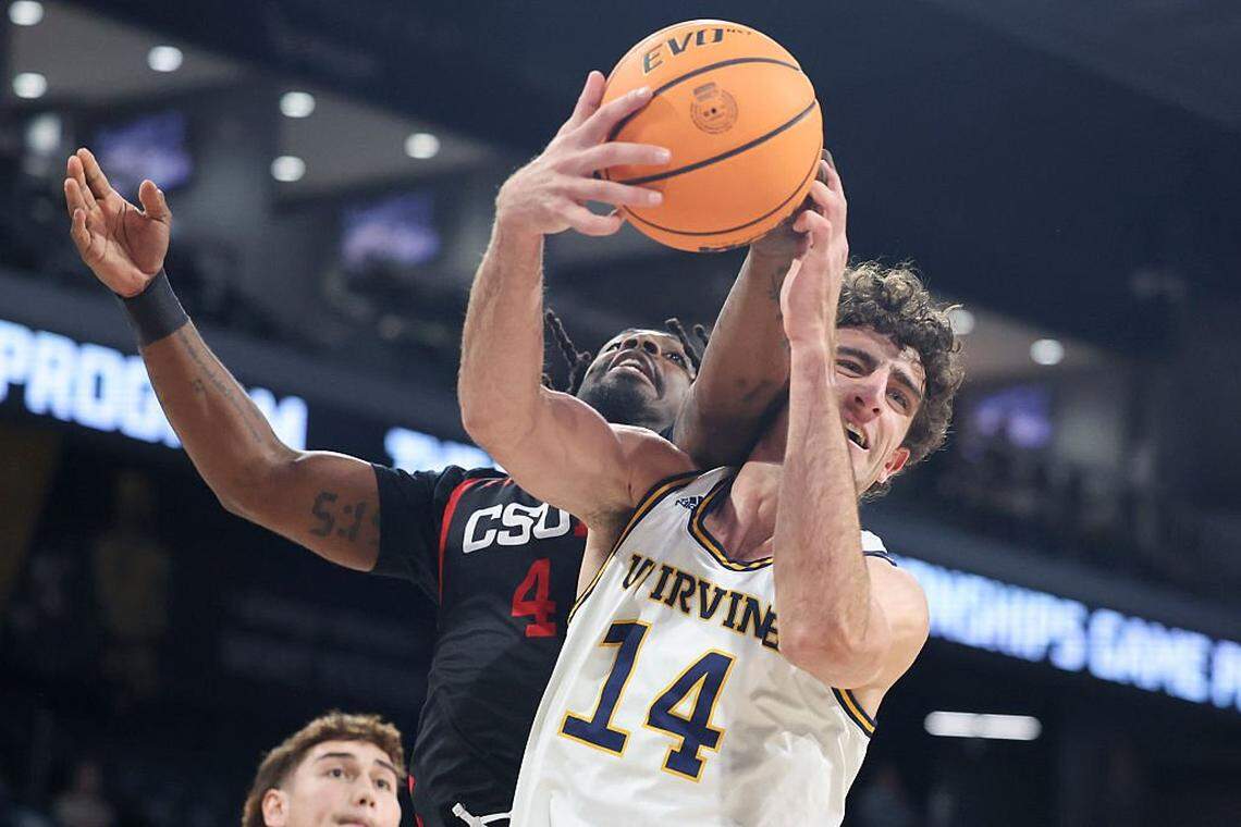 HENDERSON, NEVADA - MARCH 13: Josiah Davis #4 of the Cal State Northridge Matadors and Kyle Evans #14 of the UC Irvine Anteaters contest for a rebound in the first half of a semifinal game of the Big West Conference at Lee's Family Forum on March 13, 2026 in Henderson, Nevada. (Photo by Ian Maule/Getty Images)