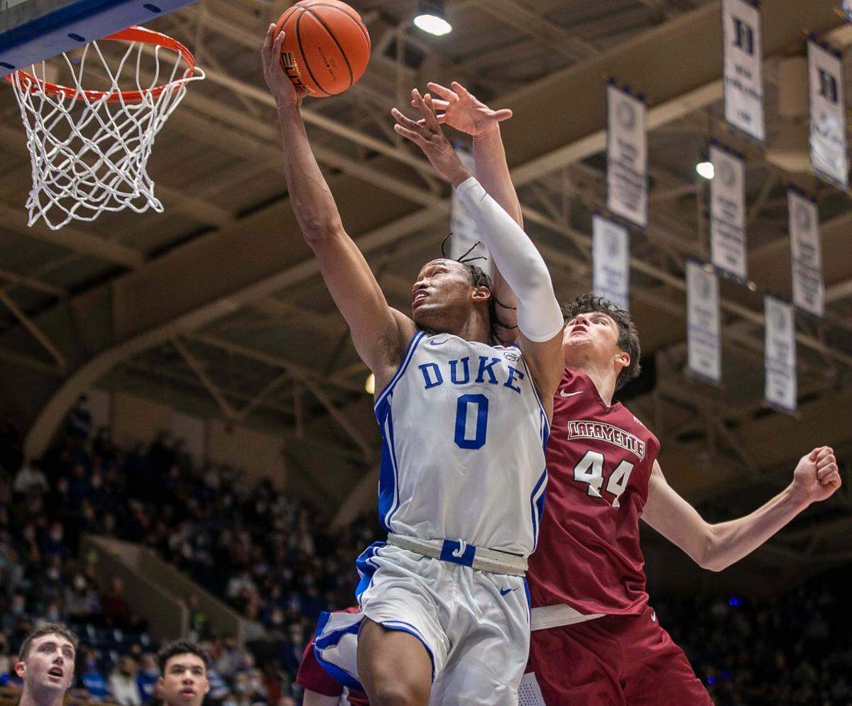 Duke’s Wendell Moore Jr. (0) drives to the basket against Lafayette’s Chris Rubayo (44) during the second half on Friday, November 19, 2021 at Cameron Indoor Stadium in Durham, N.C. Moore Jr.lead all scores with 23 points in the Blue Devils’ 88-55 victory.