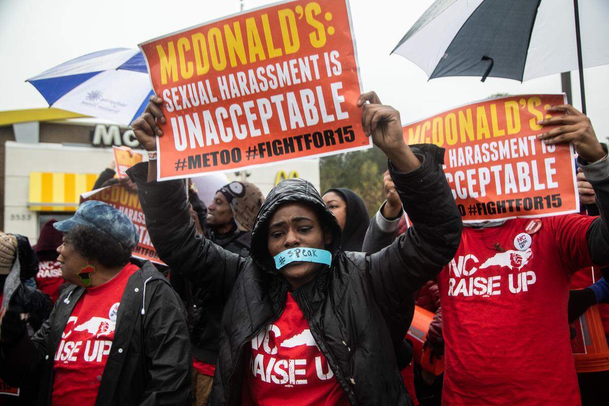 Protesters with the group Raise Up for $15 rallied outside at a McDonald’s on Hillsborough Road in Durham Tuesday, April 2, 2019. The demonstrators advocated for a higher minimum wage and demanded the fast food chain address sexual harassment claims.