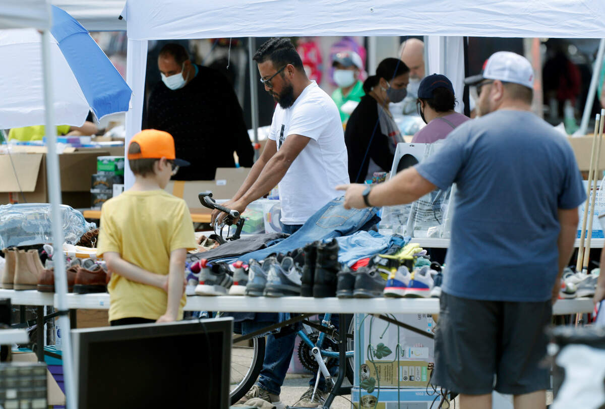 Crowds shop at the Raleigh Market at the N.C. State Fairgrounds in Raleigh, N.C., Saturday, May 15, 2021.