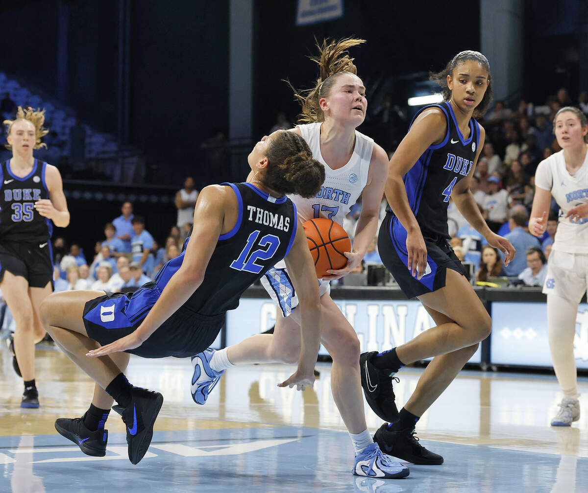 North Carolina’s Elina Aaronisalo drives past Duke’s Delaney Thomas during the first half of the Tar Heels’ game on Sunday, March 1, 2026, at Carmichael Arena in Chapel Hill, N.C. 
