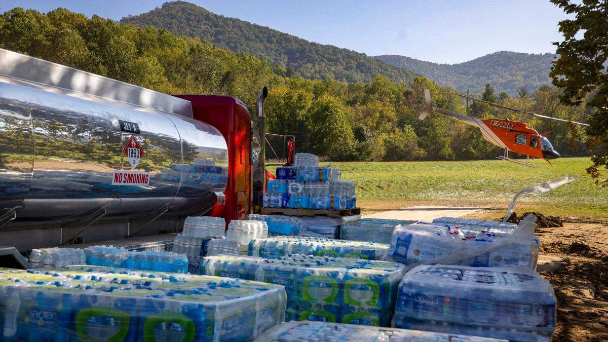 A volunteer run, Hurricane Helene relief distribution center has been set up at the Harley Davidson dealership on Tuesday, October 8, 2024 in Swannanoa, N.C. Helicopters shuttle supplies in and back out to remote regions in the area cut off by the storm.