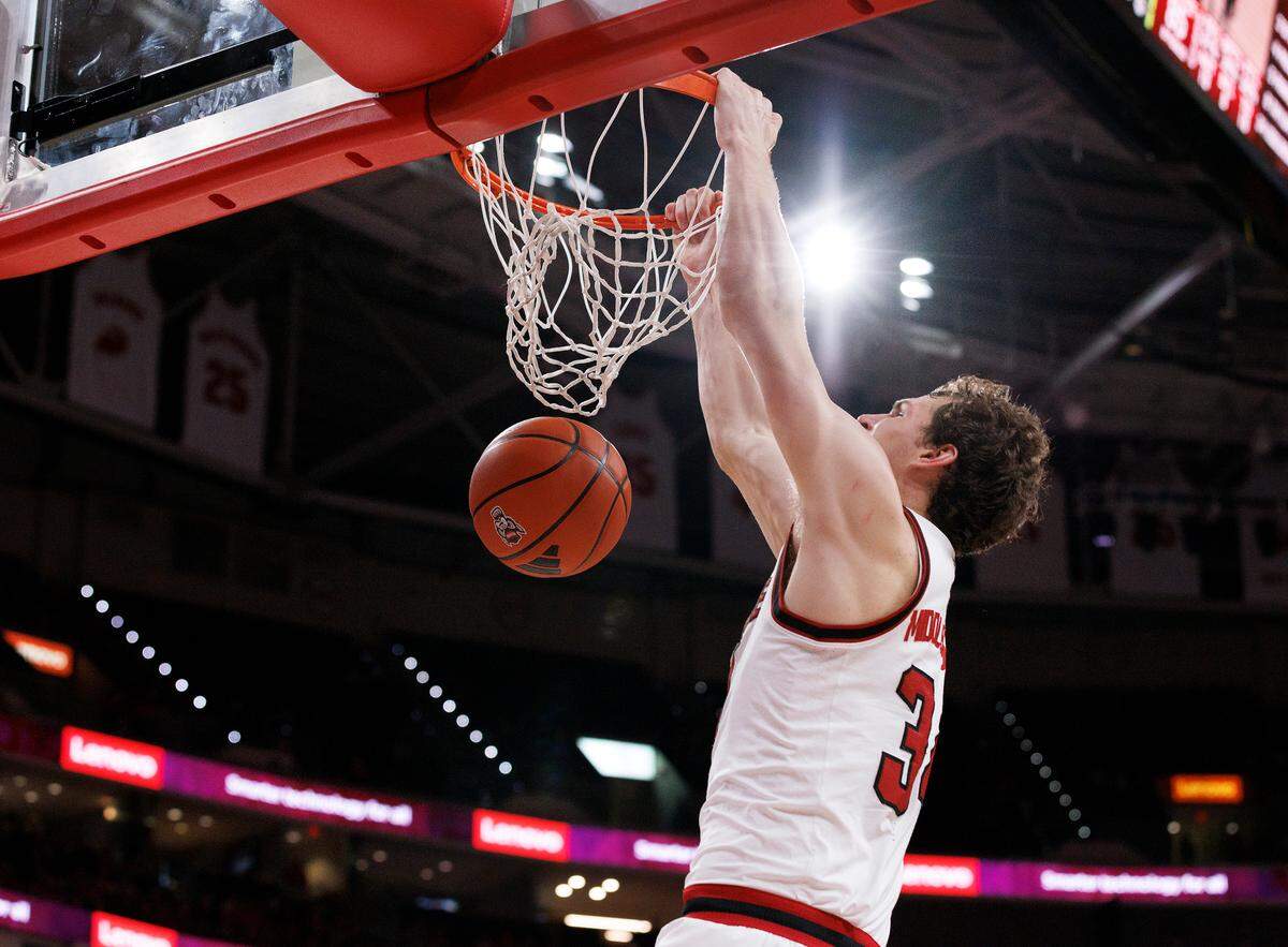 N.C. State’s Ben Middlebrooks slams in two during the second half of the Wolfpack’s 97-66 win over USC Upstate on Monday, Nov. 4, 2024, at Lenovo Center in Raleigh, N.C.