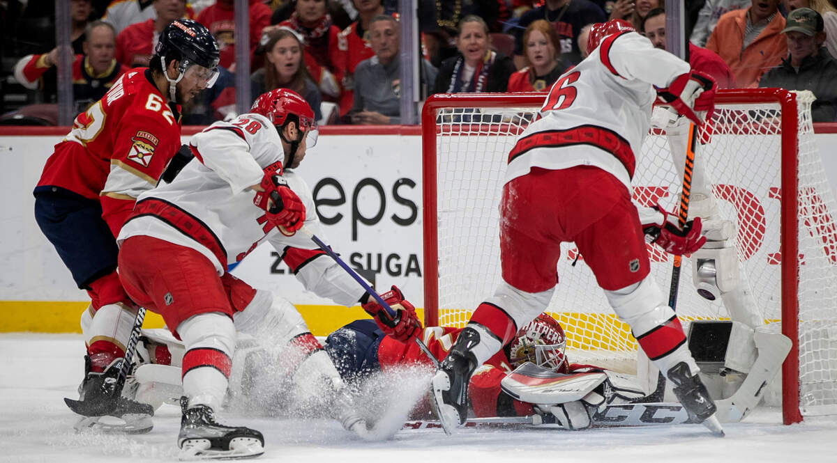 The Carolina Hurricanes Mackenzie MacEachern (28) and Paul Stastny (26) work to score on Florida Panther goalie Sergei Bobrovsky (72) in the first period of Game 4 of the Eastern Conference Finals on Wednesday, May 24, 2023 at FLA Live Arena in Sunrise, Fla.