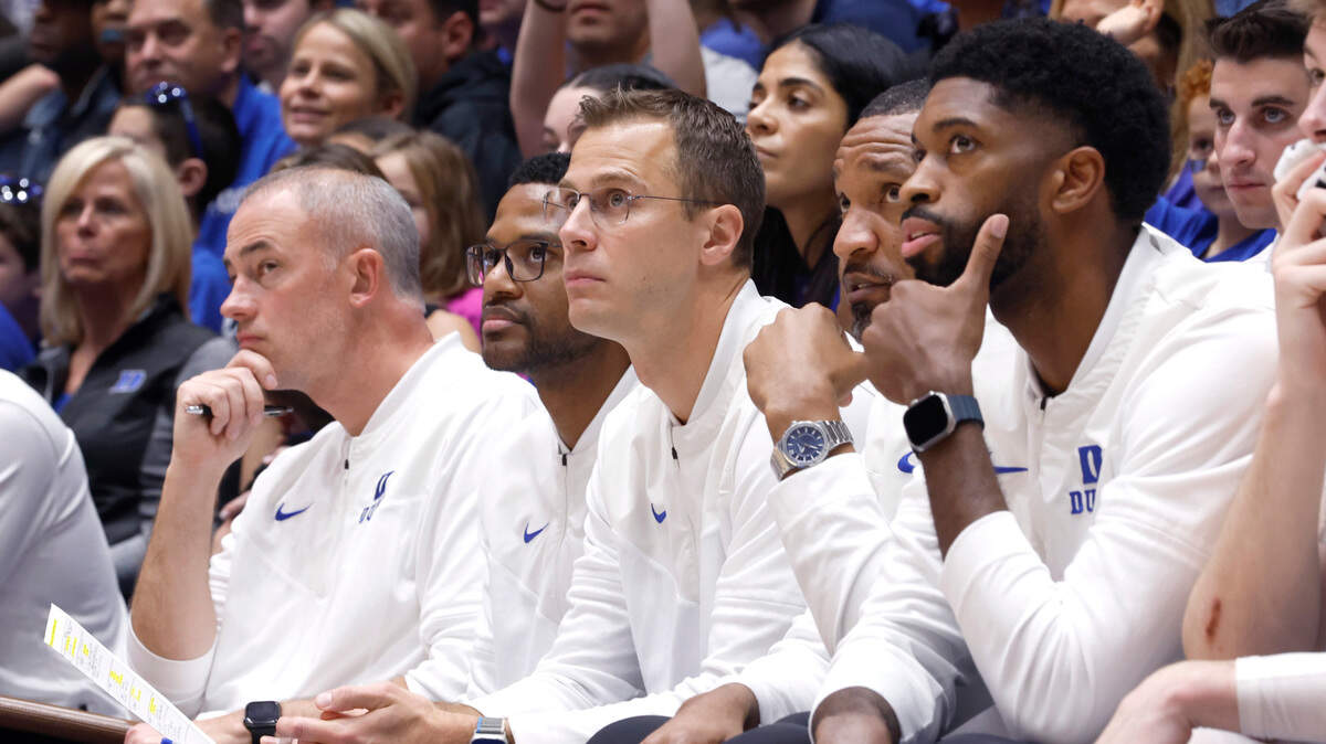 From left, Duke’s special assistant to the head coach Mike Schrage, assistant coach Jai Lucas, head coach Jon Scheyer, associate head coach Chris Carrawell and assistant coach Amile Jefferson watch during the second half of Duke’s 75-59 victory over Boston College at Cameron Indoor Stadium in Durham, N.C., Saturday, Dec. 3, 2022.