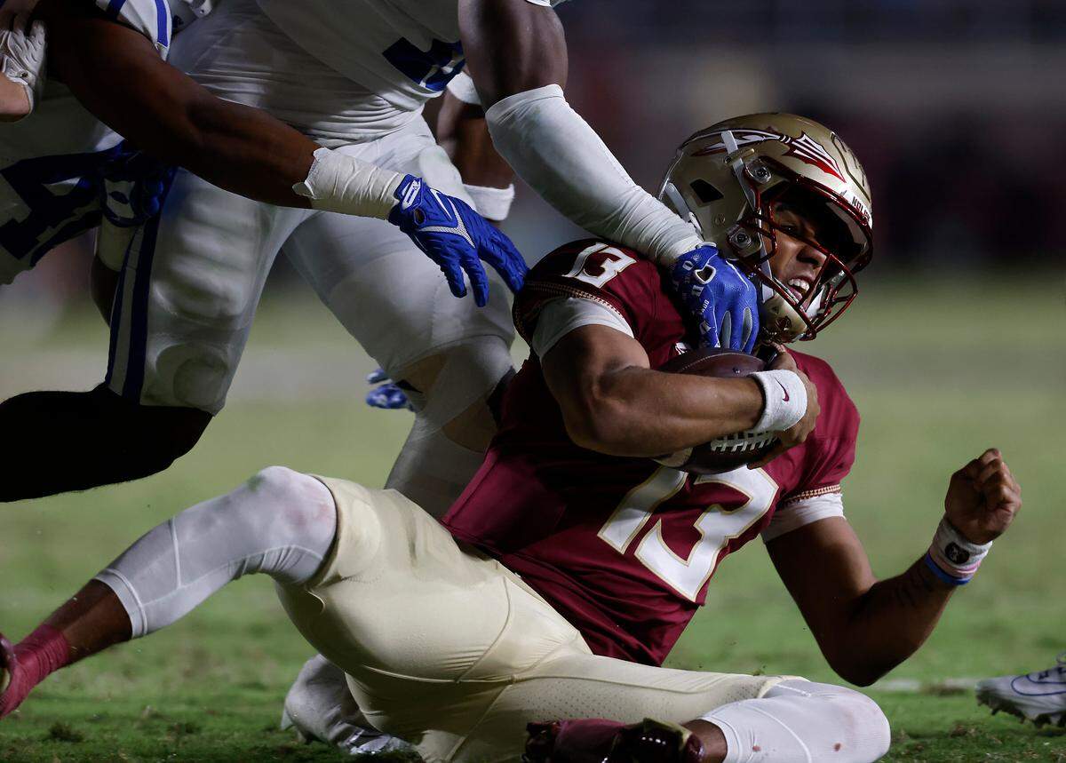 Florida State’s Jordan Travis is brought down during the second half of Duke’s 38-20 loss on Saturday, Oct. 21, 2023, in Tallahassee, Fla.