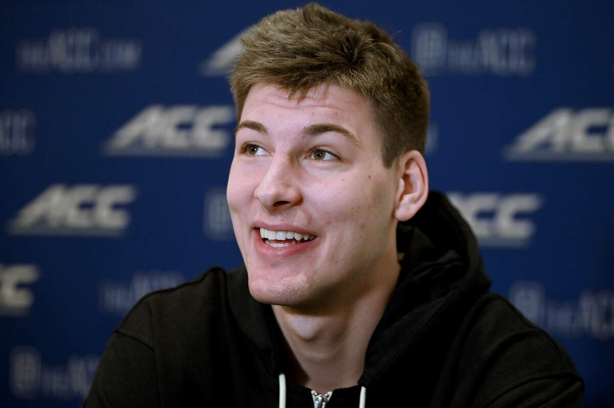 Duke center Kyle Filipowski smiles as he listens to a reporter’s question during the ACC Men’s TipOff event at the Hilton Charlotte Uptown Hotel on Wednesday, October 25, 2023 in Charlotte, NC.