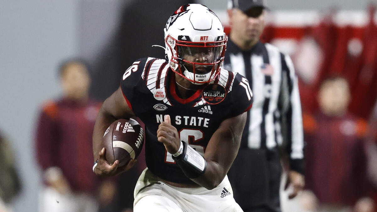 N.C. State quarterback MJ Morris (16) scrambles for yards during the second half of N.C. State’s 22-21 victory over Virginia Tech at Carter-Finley Stadium in Raleigh, N.C., Thursday, Oct. 27, 2022.