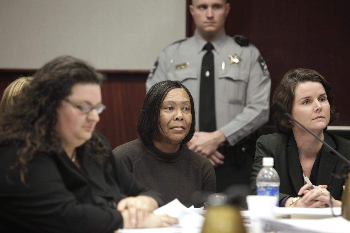 In this 2009 file photo, Faye Brown, center, listens as special deputy Attorney General Tiare Smiley questions North Carolina Correctional Institution for Women superintendent, Kenneth Royster during a hearing in a Wake County courtroom.. Brown was one of several inmates who were given life terms in the 1970s that defined ‘life’ as 80 years and was ruled eligible for release. The NC Supreme Court overruled that decision.