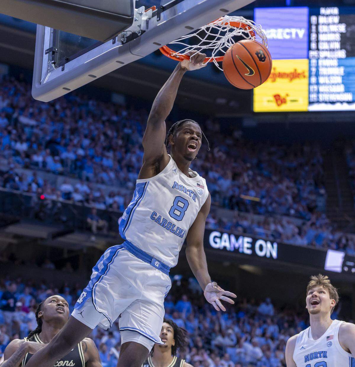 North Carolina forward Caleb Wilson (8) breaks to the basket for a dunk against Wake Forest in the first half on Saturday, January 10, 2026 at the Smith Center in Chapel Hill, N.C.