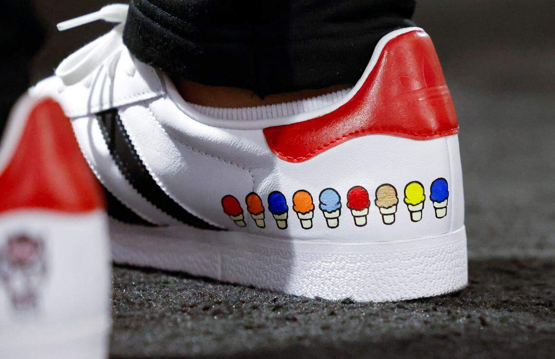 N.C. State head coach Kevin Keatts wears custom sneakers with an ice cream cone for each win in the post season. Photographed after the Wolfpack’s practice at State Farm Stadium in Glendale, Ariz., Friday, April 5, 2024. The Wolfpack will face Purdue in the NCAA Tournament national semifinals Saturday.