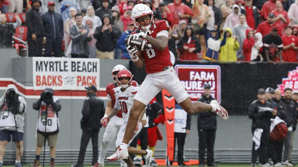 Photos: NC State battles Louisville in key ACC football action