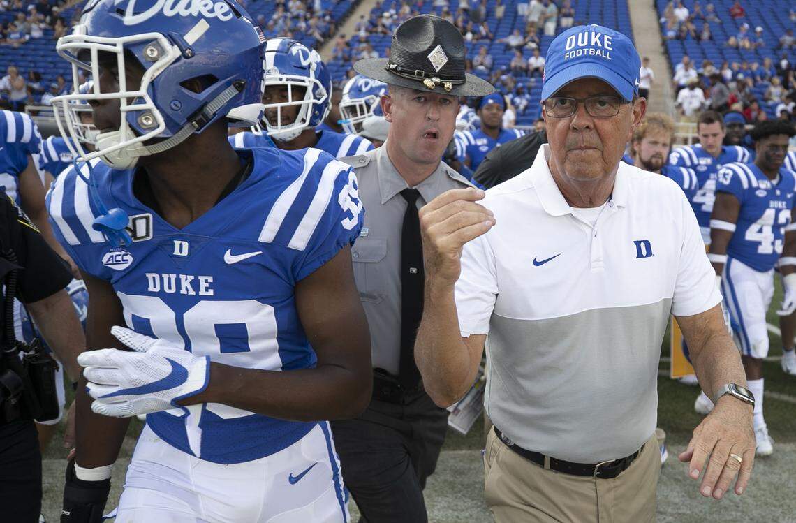 Duke coach David Cutcliffe heads to mid-field to shake hands with Georgia Tech coach Geoff Collins following the Blue Devils’ 41-23 victory on Saturday October 12, 2019 at Wallace Wade Stadium in Durham, N.C.
